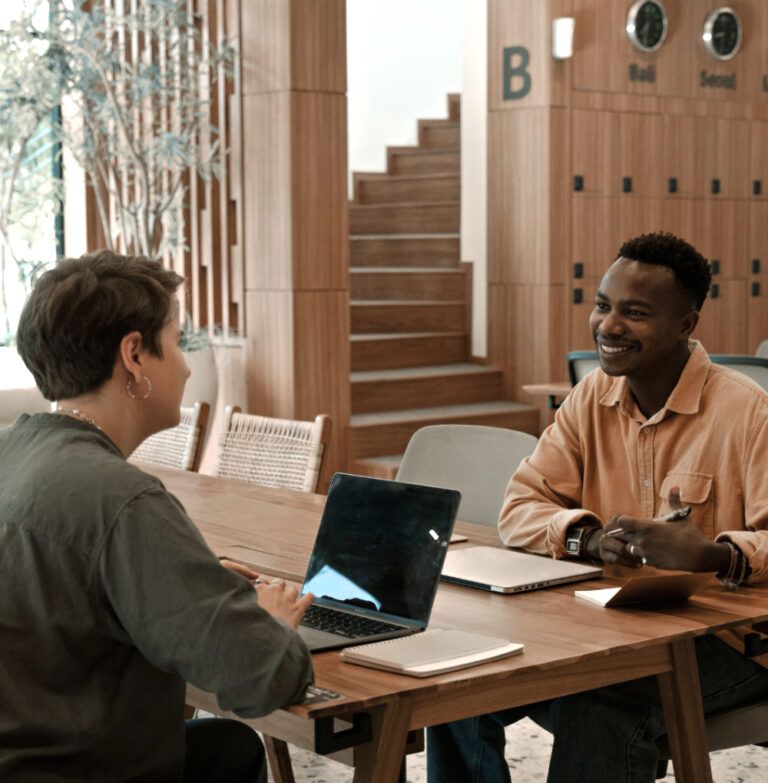 Two young students in a career guidance discussion, preparing for study, work, or internship options after completing their GED